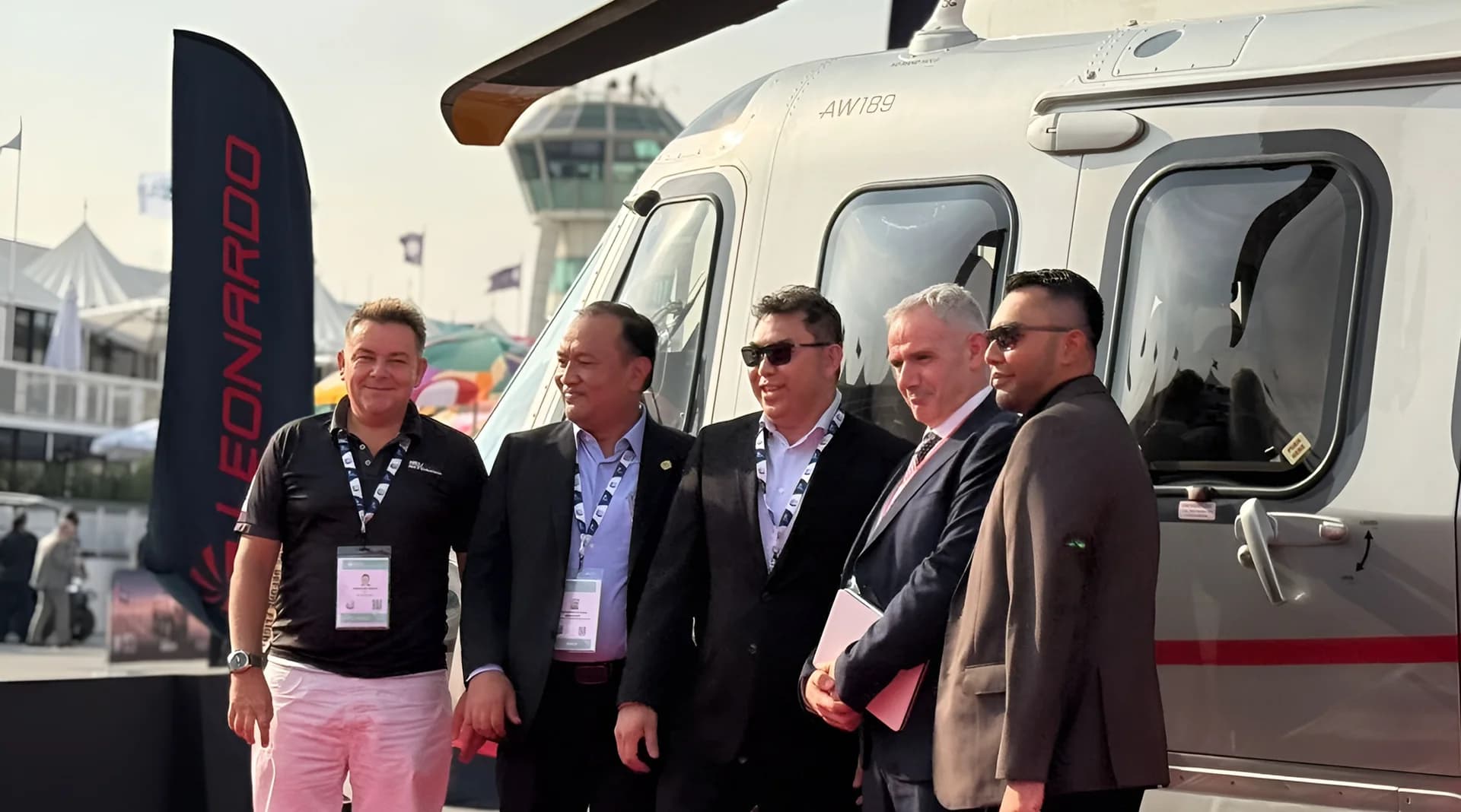 Heli Skycargo team in front of a Leonardo AW189 helicopter
